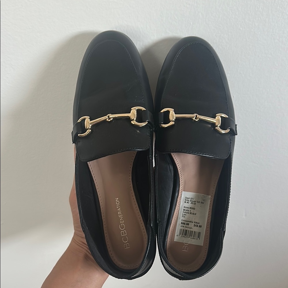 BCBGeneration Black and Gold Flats with Horsebit Detail
